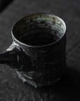 Carved Tea Pourer
